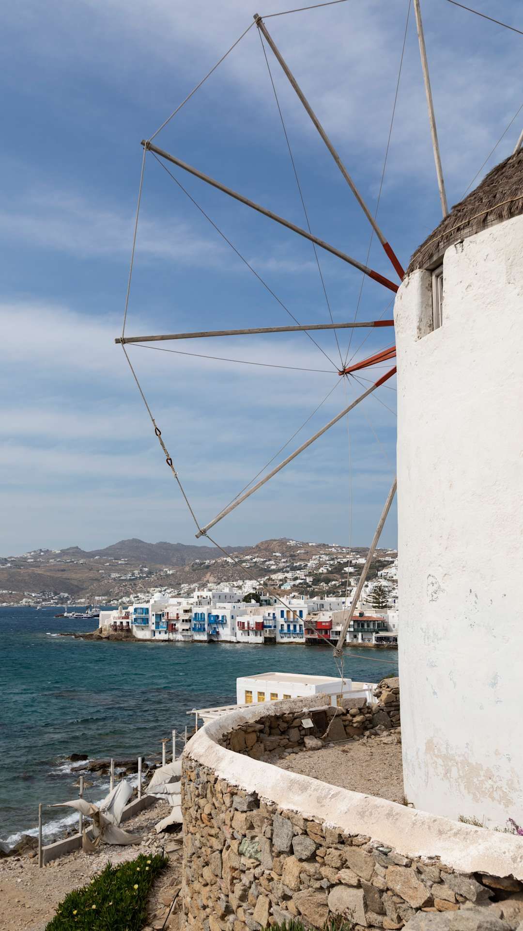 coastal view from behind a windmill in rhodes greece